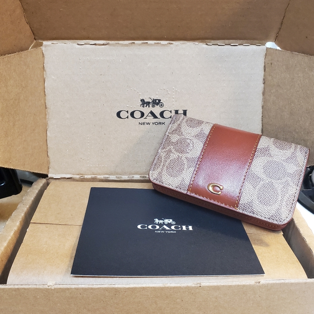 Coach Slim Wallet in Signature coated canvas